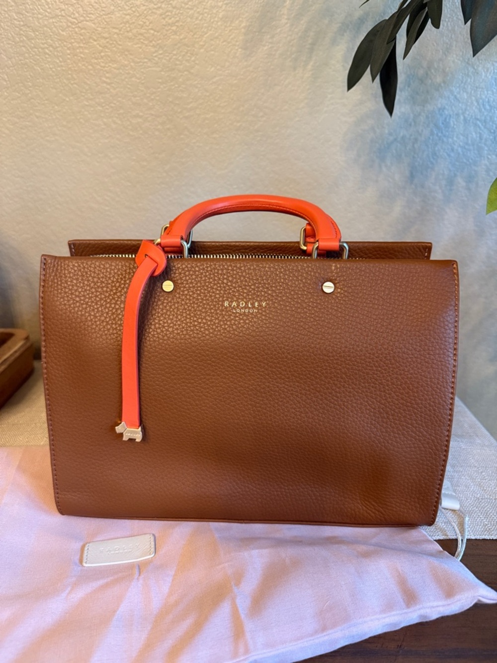 RADLEY LONDON Brown Pebbled Leather Satchel with Coral Handle Accent